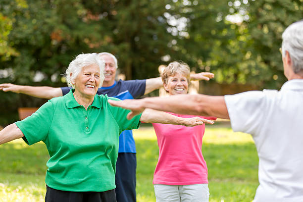 istock Seniors - gymnastics in the park 503698349