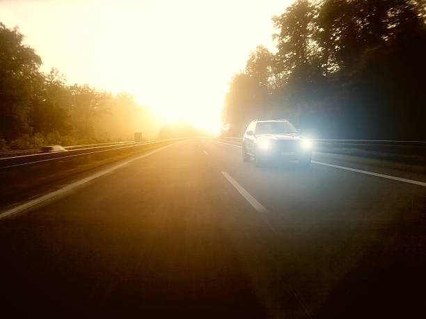istock car in morning light on highway 503698355