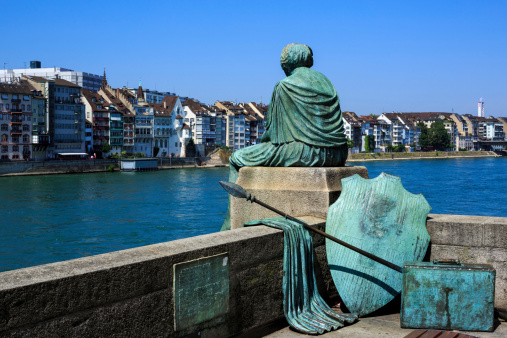 A photograph of the Helvetia statue on the Rhine in Basel, Switzerland. Shot on the hottest day of the year so far at 35 degrees.