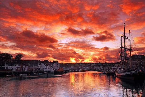 Weymouth harbour at sunset Dorset weymouth harbour at sunset, England, UK weymouth dorset stock pictures, royalty-free photos & images