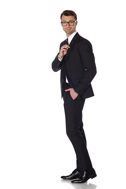 istock Business man in black suite on white background 503700423