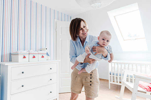 istock Mother playing with her little son, affectionately smiling to him 503700835