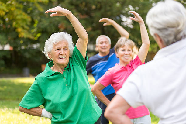 istock Seniors - gymnastics in the park 503700903