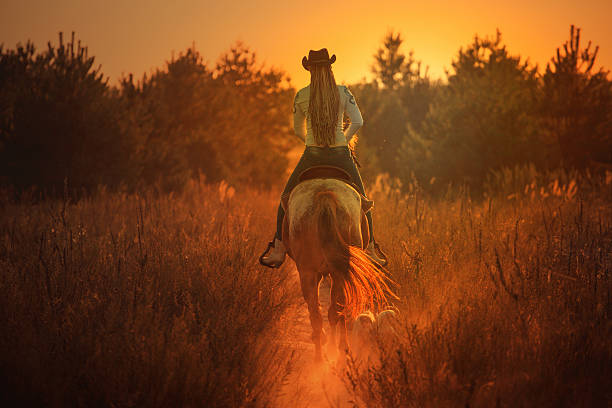 istock girl and horse 503705384
