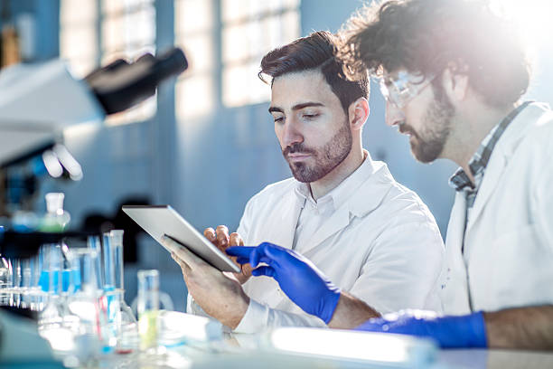 istock Young scientists works in modern laboratory 503705690