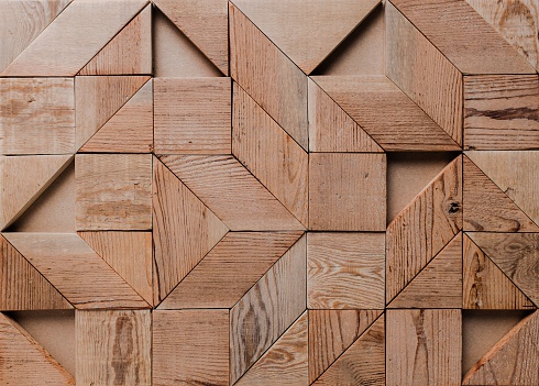 abstract background of geometric wood pieces.