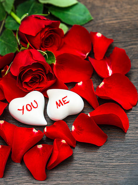 istock Red roses and two hearts. Valentines Day decoration 503706018