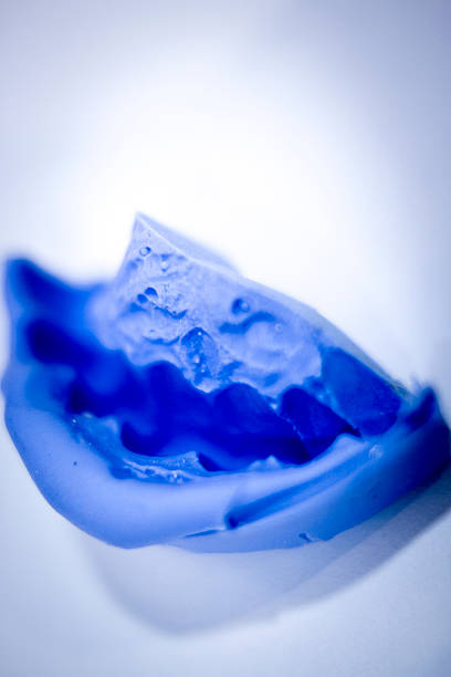 istock Dental prosthetics clay tooth mold 503706388
