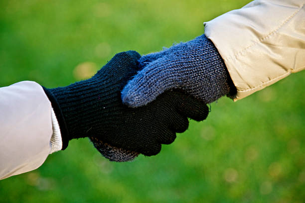 Hand shaking after done with agreement in the white background