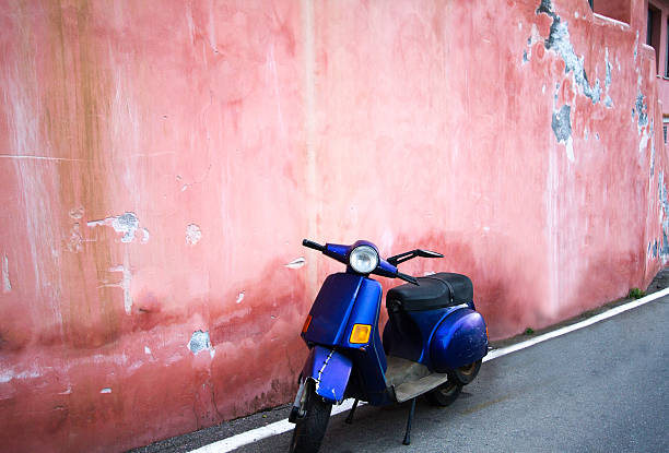 istock Vintage Blue Scooter, Bright Pink Old Wall, Italy 503708244