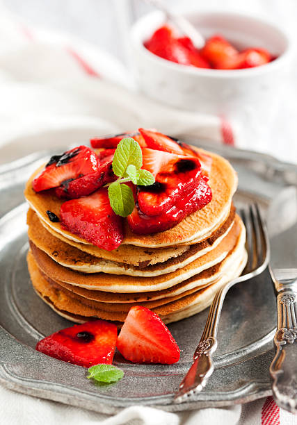 istock Stack of pancakes with fresh strawberry and balsamic glase 503710240