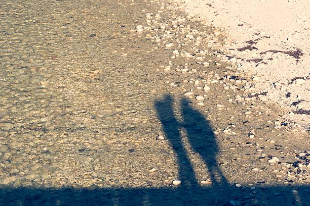 istock Shadow silhouette of a couple embracing each other. 503710856
