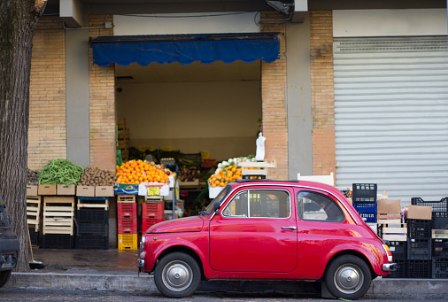 Cute Red Vintage Car And Vegetable Market, Italy