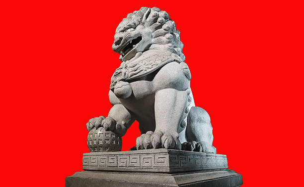 istock Chinese Imperial Lion Statue  on red background. 503712926
