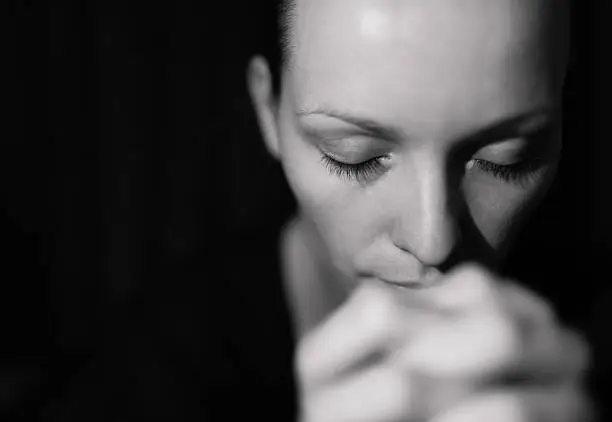 Photo of Praying woman
