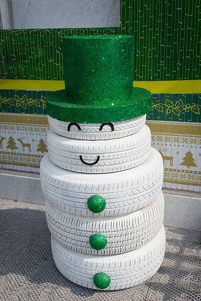 Decoration of snowman made by tire car