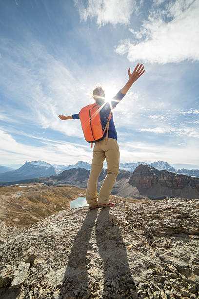 istock Hiker celebrating on mountain top 503719644