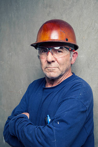 istock Senior Construction Worker with Arms Crossed 503729316