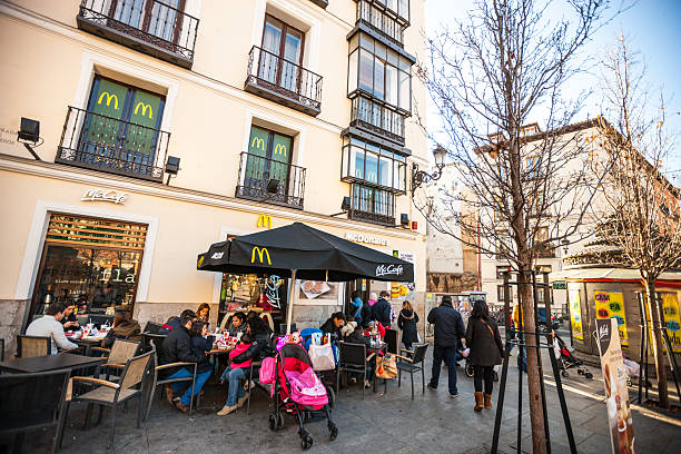 Madrid, Spain - December 22, 2013: People eating in McCafe, Madrid, Spain