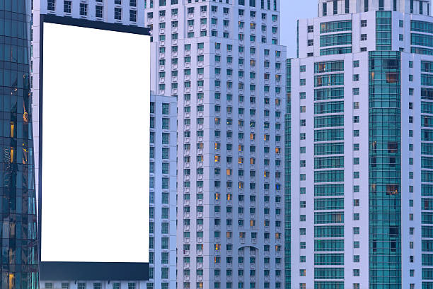istock blank billboard on the building at night time 503731026