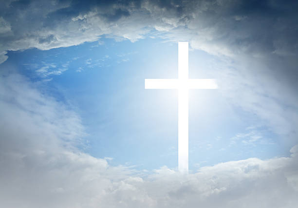 istock Religious cross of light on the sky 503731462