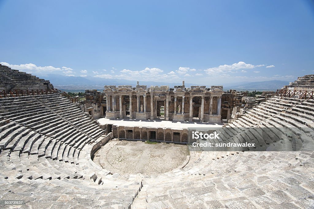 Ancient amphitheater Ancient amphitheater in Pamukkale Amphitheater Stock Photo