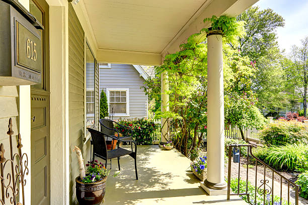 istock House column entrance porch with chairs 503731767