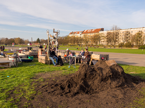 Berlin, Germany - April 20, 2013: People roaming around Tempelhofer Park, a former military airport turned park in Berlin, Germany