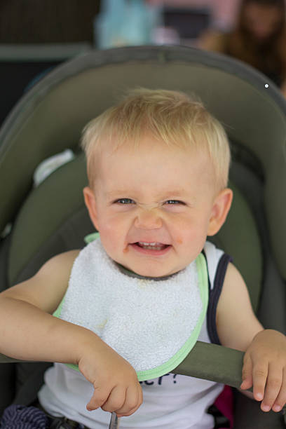 istock Happy baby baby feeding himself 503732573