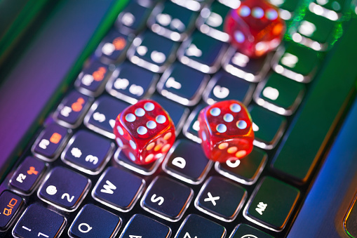 illuminated keyboard with red dices