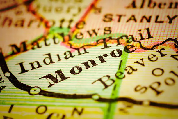 Monroe, North Carolina on 1880's map. Selective focus and Canon EOS 5D Mark II with MP-E 65mm macro lens.