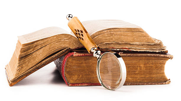 istock magnifying glass and old law books 503736674