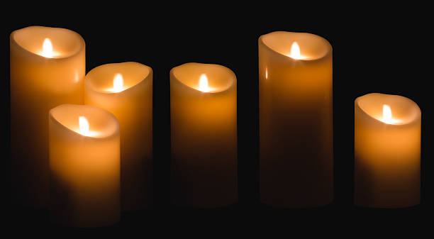 istock Candle Light, Three Wax Candles Lights in Night, Black Background 503737844
