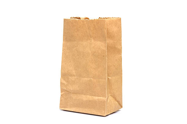 istock Brown paper bag isolated over white background 503738368
