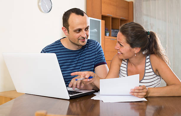 istock Insurance agent helping client to choose the product 503739374