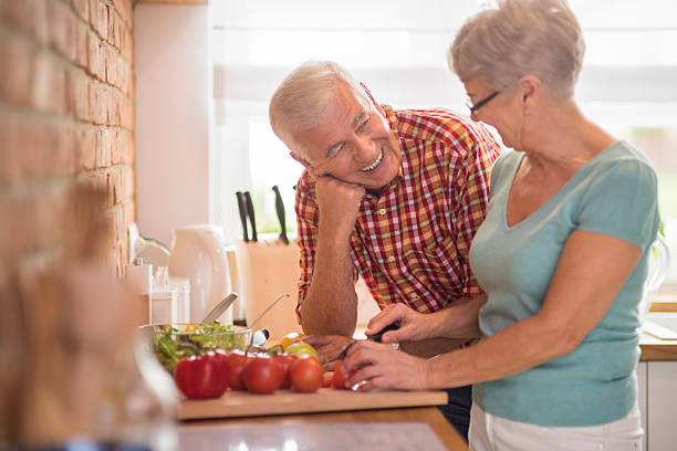 istock Cooking woman and her cheerful husband 503742852