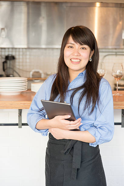 istock Young japanese lady manager of cafe restrant 503753592