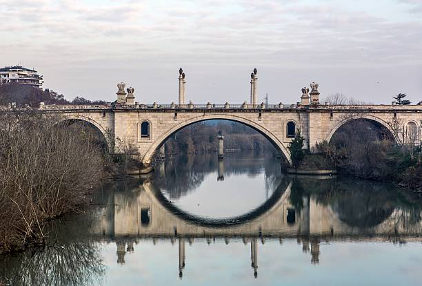 Flaminio Bridge now known as Corso Francia. The first stone was laid in 1938 at the behest of the Duce on a project by the architect Brasini. It is the first monumental bridge over the Tiber in northern Rome.
