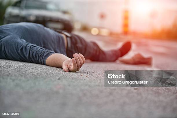 Traffic Accidentyoung Man Hit By A Car Stock Photo - Download Image Now - Men, Dead, Street