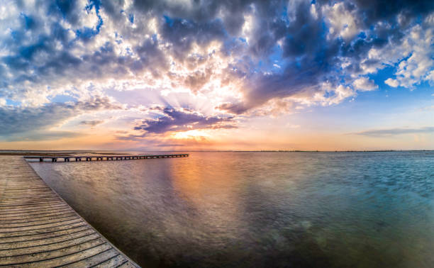 istock sunset pier delta ebro spain colored hdr cloud 503755406