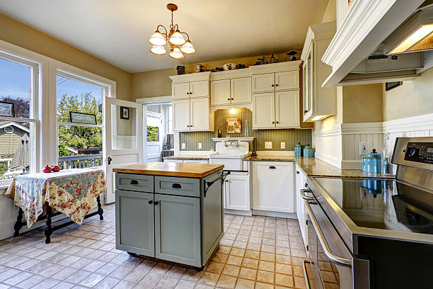 istock Kitchen interior in old house with island and antique table 503757169