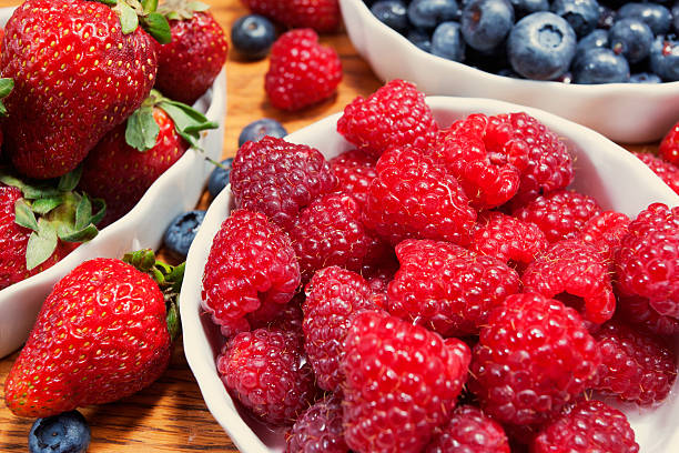 Raspberries, Blueberries and strawberries stock photo