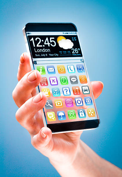 istock Smartphone with transparent screen in human hands. 503759391