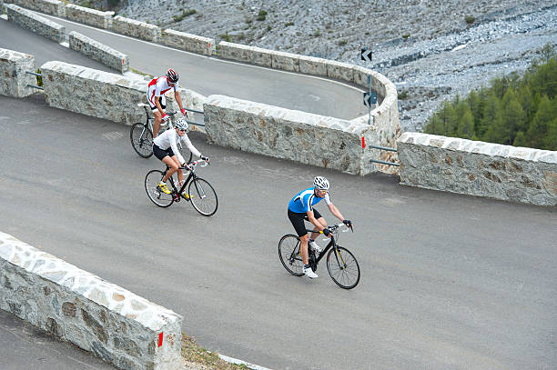 istock friends with road cycles on uphill 503759426