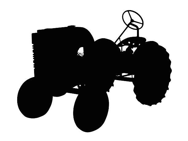 Old tractor parked on the grass