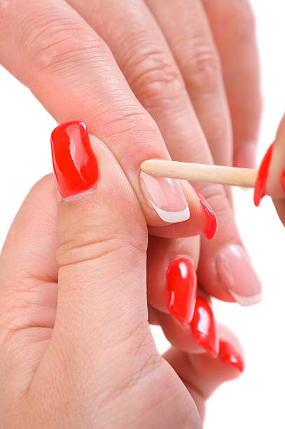 istock manicure applying - cleaning the cuticles 503761317