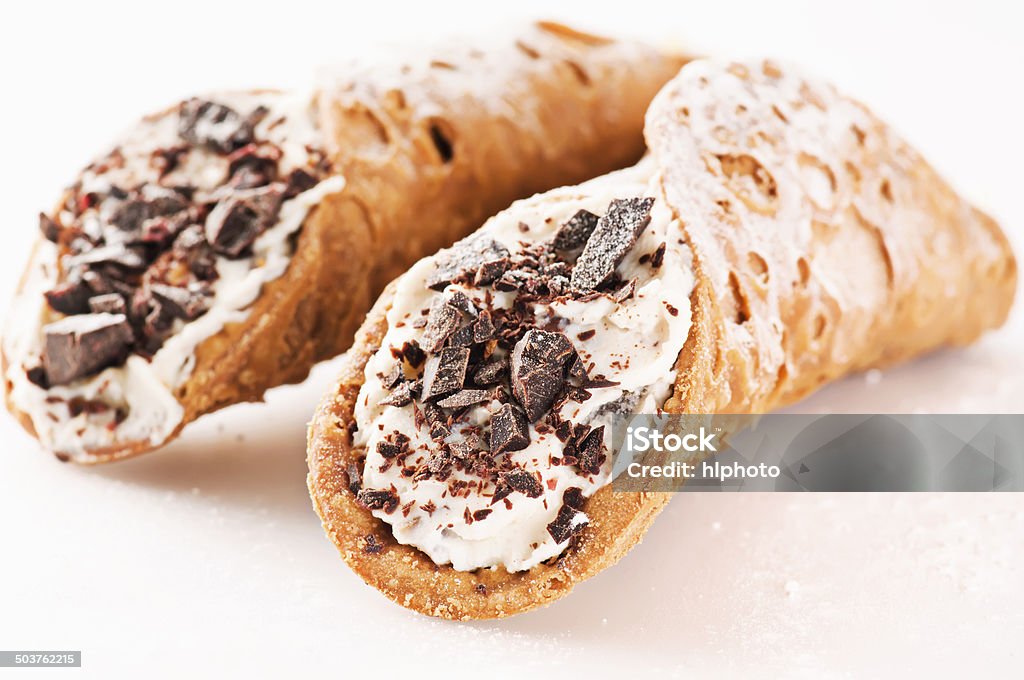 Cannoli Cannoli with ricotta chocolate filling as closeup on white background Cannoli Stock Photo