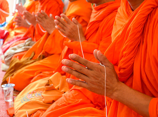 istock pray, the monks and religious rituals in thai ceremony 503763625