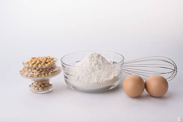 istock Composition of flour and eggs. Isolated on a white background. 503765914