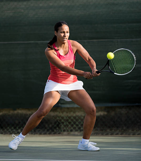 istock Young mixed race girl playing tennis 503776484